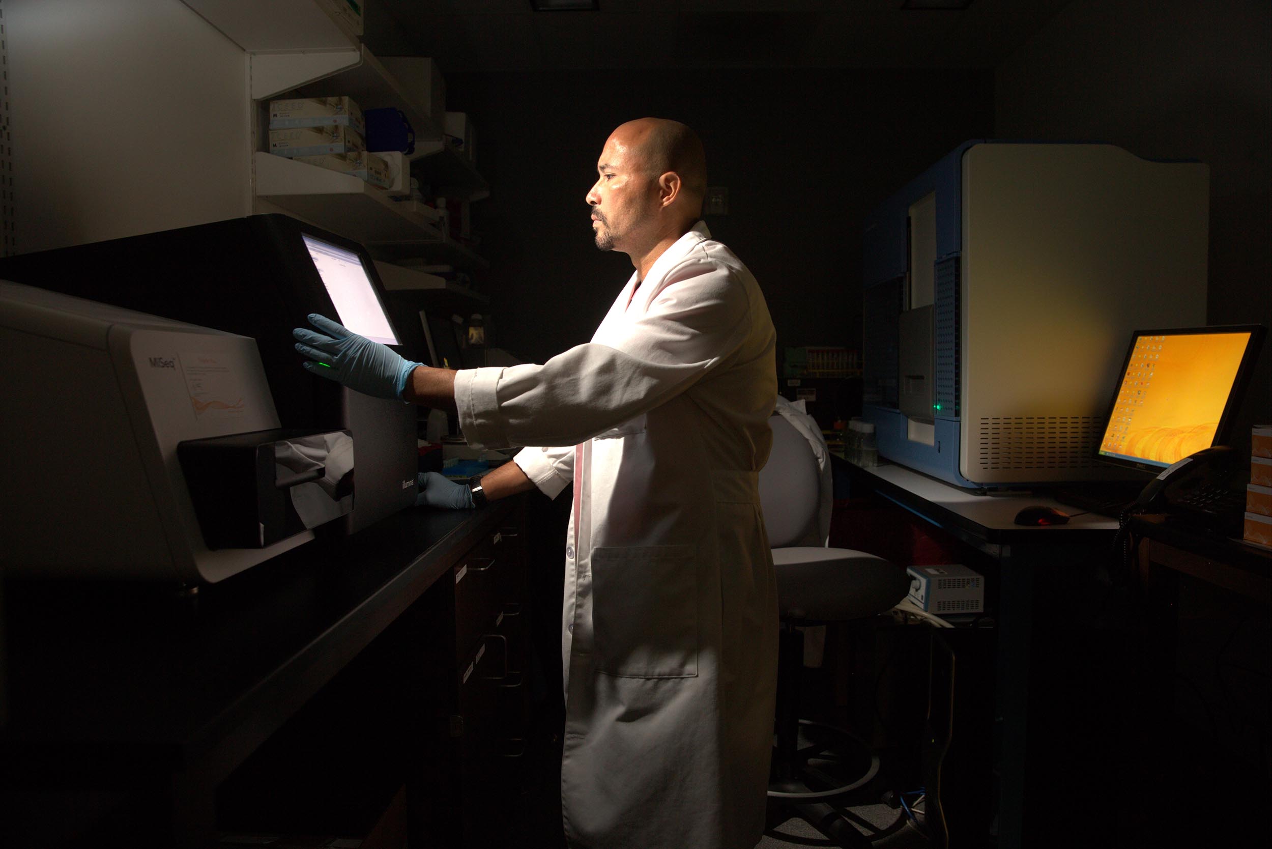 A scientist at the Louisiana Cancer Research Center studies results