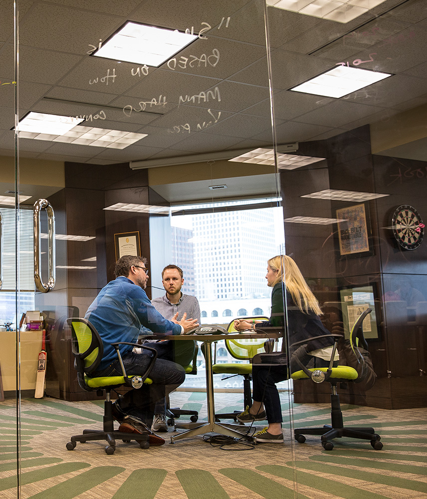 A team meets in a modern office space