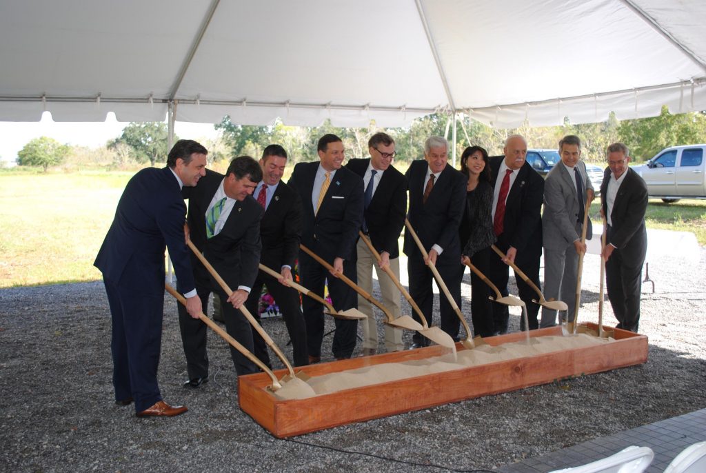 A team of business leaders breaking ground