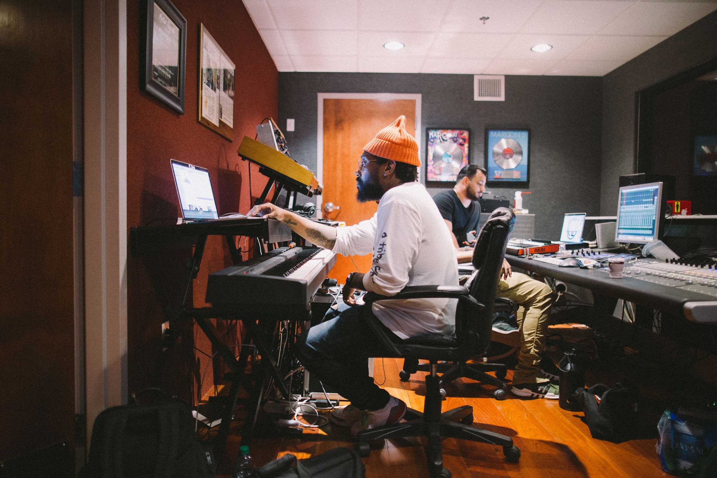 A member of the New Orleans Music Economy works in a recording studio